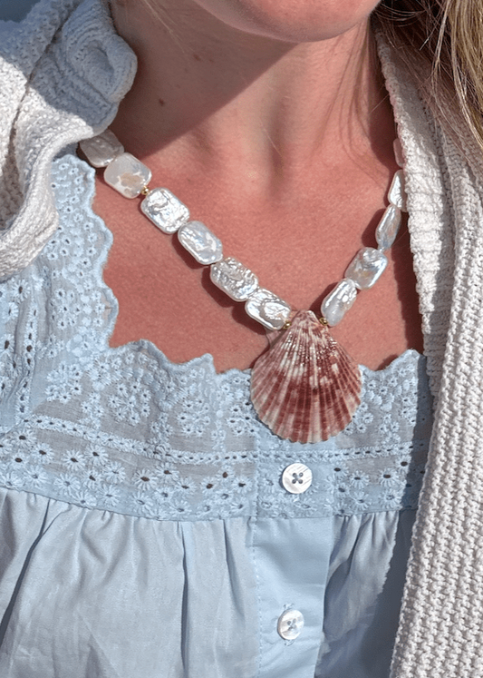 Pendentif en perle de coquillage
