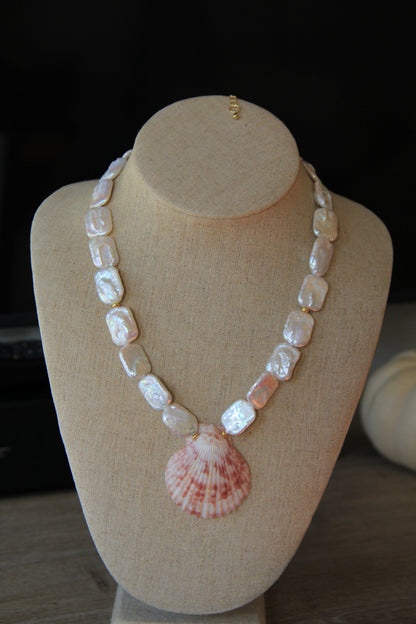 Pendentif en perle de coquillage